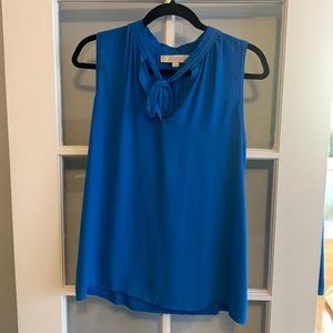 Royal blue shell blouse with bow tie at neck